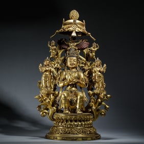 A BRONZE-GILT FIGURE OF MAITREYA