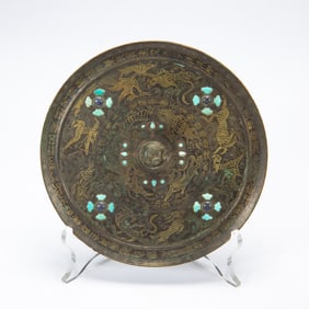 A HARDSTONES INLAID GOLD AND SILVER DECORATED BRONZE MIRROR