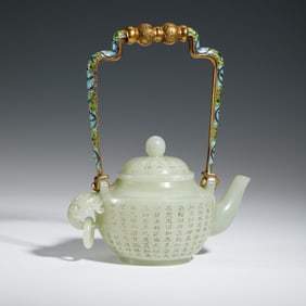 A CARVED AND INSCRIBED WHITE JADE TEAPOT
