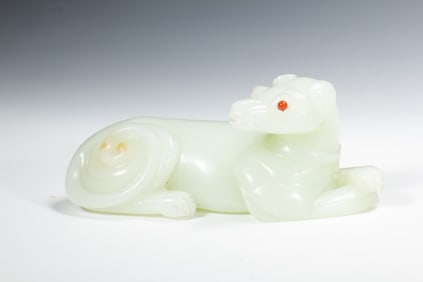 AN IMPERIAL CARVED WHITE JADE HOUND