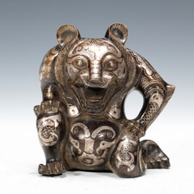 A SILVER INLAID BRONZE BEAR