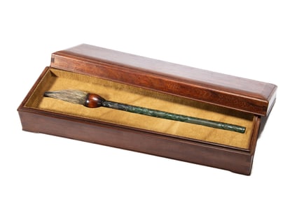 A CARVED JADE CALLIGRAPHY BRUSH WITH BOX