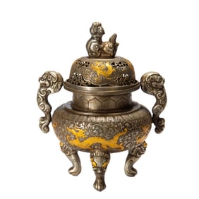 A GOLD AND SILVER PLATED INCENSE BURNER WITH COVER