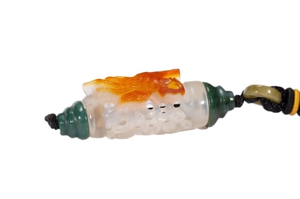 A CARVED AGATE POMANDER CASE