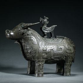 A VERY RARE CHINESE ARCHAISTIC BRONZE BUFFALO VESSEL WITH COVER