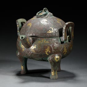 A GOLD AND SILVER INLAID BRONZE VESSEL WITH COVER