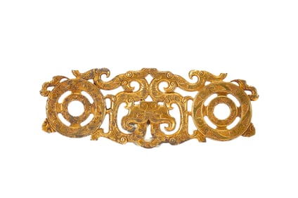 A BRONZE-GILT DRAGON ORNAMENT