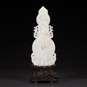 A CARVED WHITE JADE TAVLET GUIBI