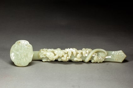 A CARVED WHITE JADE DRAGON RUYI SCEPTER