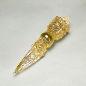 A CARVED CITRINE PHURBA