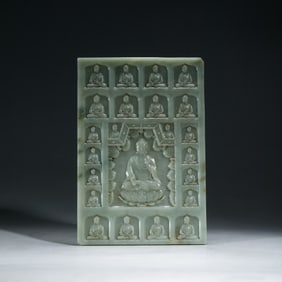A CARVED CELADON JADE BUDDHA PLAQUE