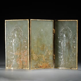 A FINE CARVED AND INSCRIBED JADE BUDDHIST PLAQUE