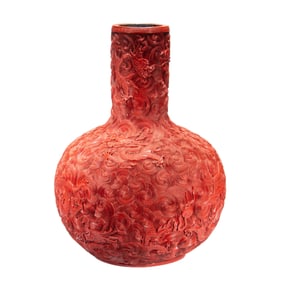 A FINE CARVED CINNABAR LACQUER DRAGON AND CLOUDS GLOBULAR VASE