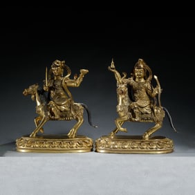 TWO BRONZE-GILT GODS OF WEALTH