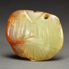 AN ARCHAISTIC JADE MYTHICAL BIRD