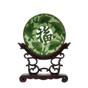 A CARVED SPINACH GREEN JADE TABLE SCREEN