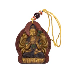 A TIBETAN POLYCHROME PAINTED TSA-TSA