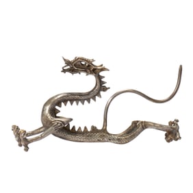 A SILVER WALKING DRAGON