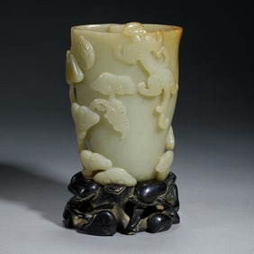 A CARVED WHITE JADE CHILONG CUP