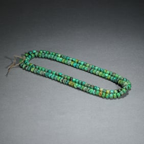 A TURQUOISE BEADED NECKLACE