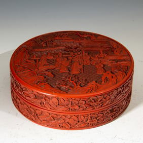 A CARVED CINNABAR LACQUER BOX WITH COVER