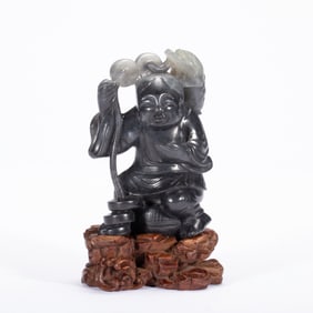 A CARVED JADE LIUHAI WITH GOLDEN FROG