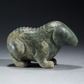 A CARVED JADE BEAR