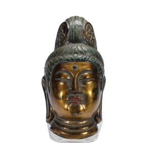 A BRONZE BODHISATTVA HEAD