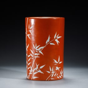 A CHINESE IRON RED GLAZE BAMBOO BRUSHPOT