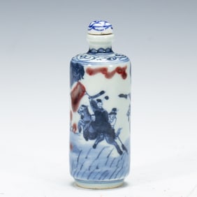 AN UNDERGLAZE BLUE AND COPPER RED SNUFF BOTTLE