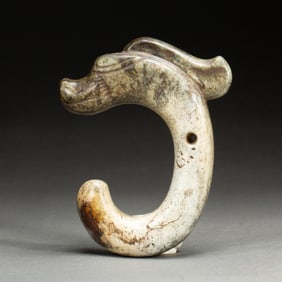 AN ARCHAISTIC JADE C-FORM DRAGON