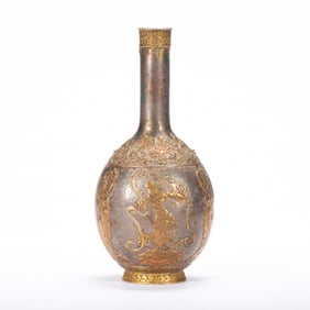A SILVER PARTLY GILT BOTTLE VASE
