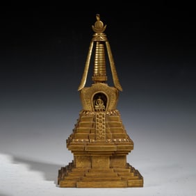 A TIBETAN BRONZE-GILT STUPA