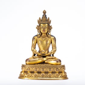 A TIBETAN BRONZE-GILT AMITAYUS