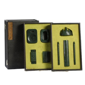 A SET OF CARVED SPINACH GREEN JADE LITERATI ITEMS