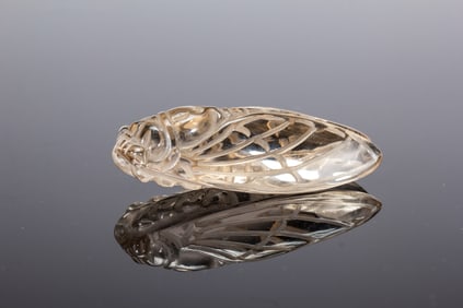 A CARVED ROCK CRYSTAL CICADA