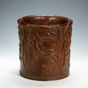 A CARVED HUANGHUALI CHILONG BRUSHPOT