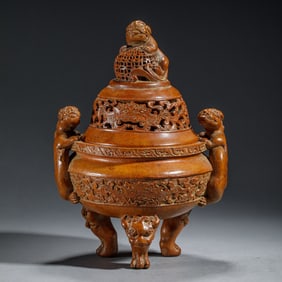 A CARVED BAMBOO TRIPOD CENSER WITH COVER