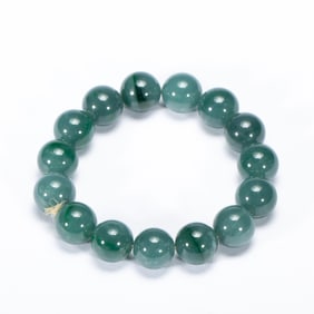 A JADEITE BEADS BRACELET