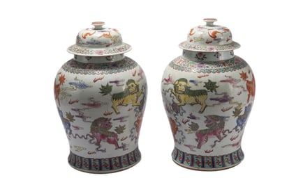 PAIR OF FAMILLE ROSE MYTHICAL BEASTS GARNITURES