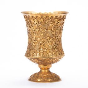 A SILVER-GILT GRAPE FRUITS WITH BEASTS CUP