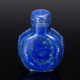 A CARVED LAPIS SNUFF BOTTLE