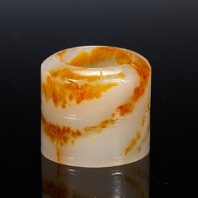 A WHITE JADE ARCHER RING