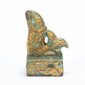 A BRONZE-GILT FISH SEAL