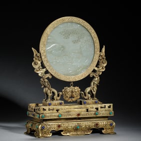 A FINE CARVED WHITE JADE PLAQUE INLAID BRONZE-GILT TABLE SCREEN