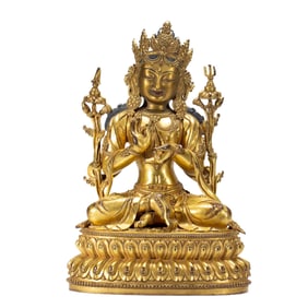 A SINO-TIBETAN BRONZE-GILT SEATED BODHISATTVA