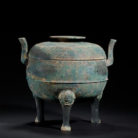 A BRONZE TRIPOD VESSEL DING WITH COVER