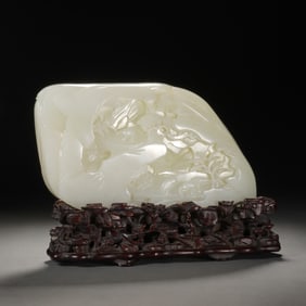 A FINE CARVED WHITE JADE BOULDER