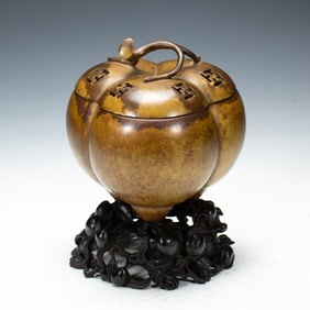 A BRONZE MELLON-FORM CENSER WITH COVER