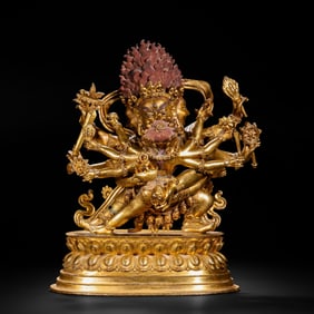 A BRONZE-GILT FIGURE OF GUHYASAMAJA
